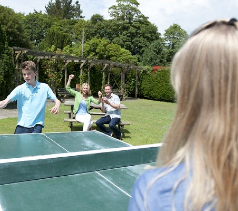 playing table tennis outside on holiday