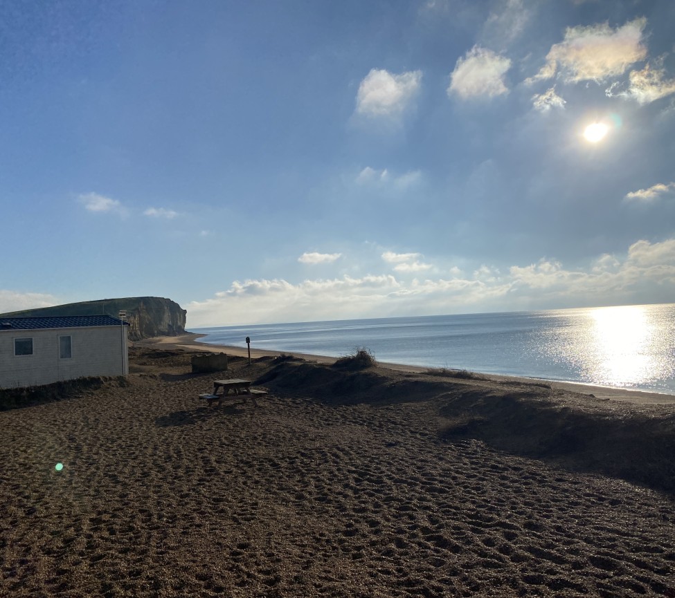 Freshwater Beach with caravans t=right by the beach
