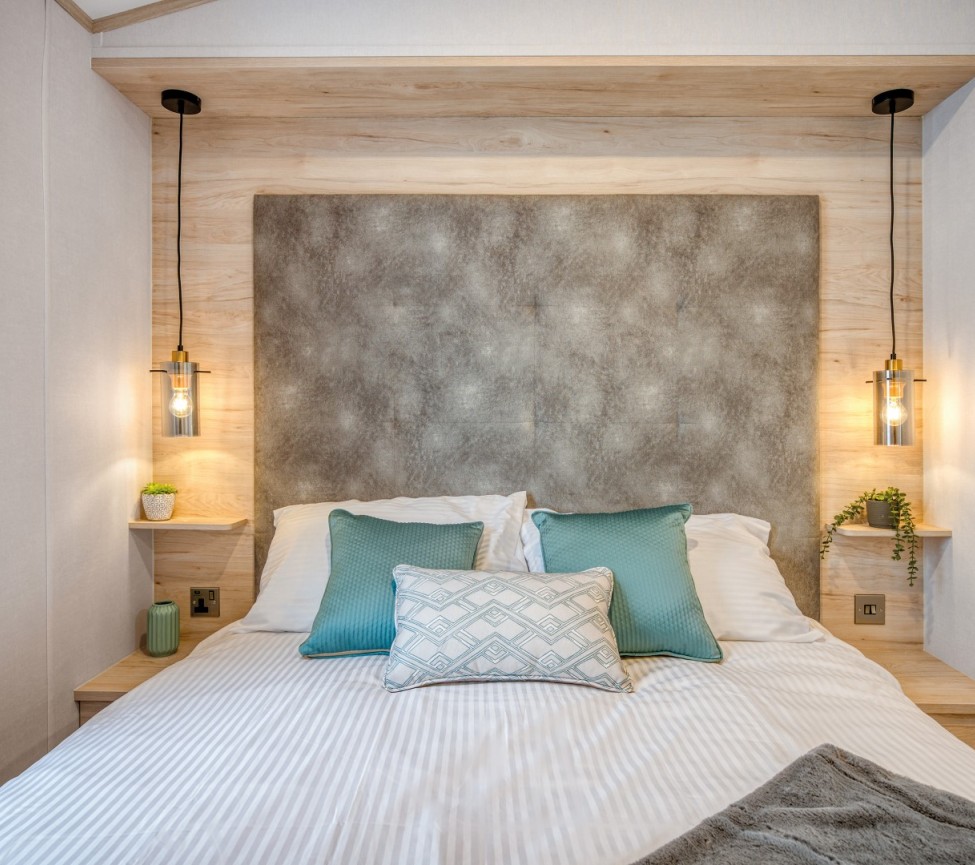 Atlas Image master bedroom with fabric headboard