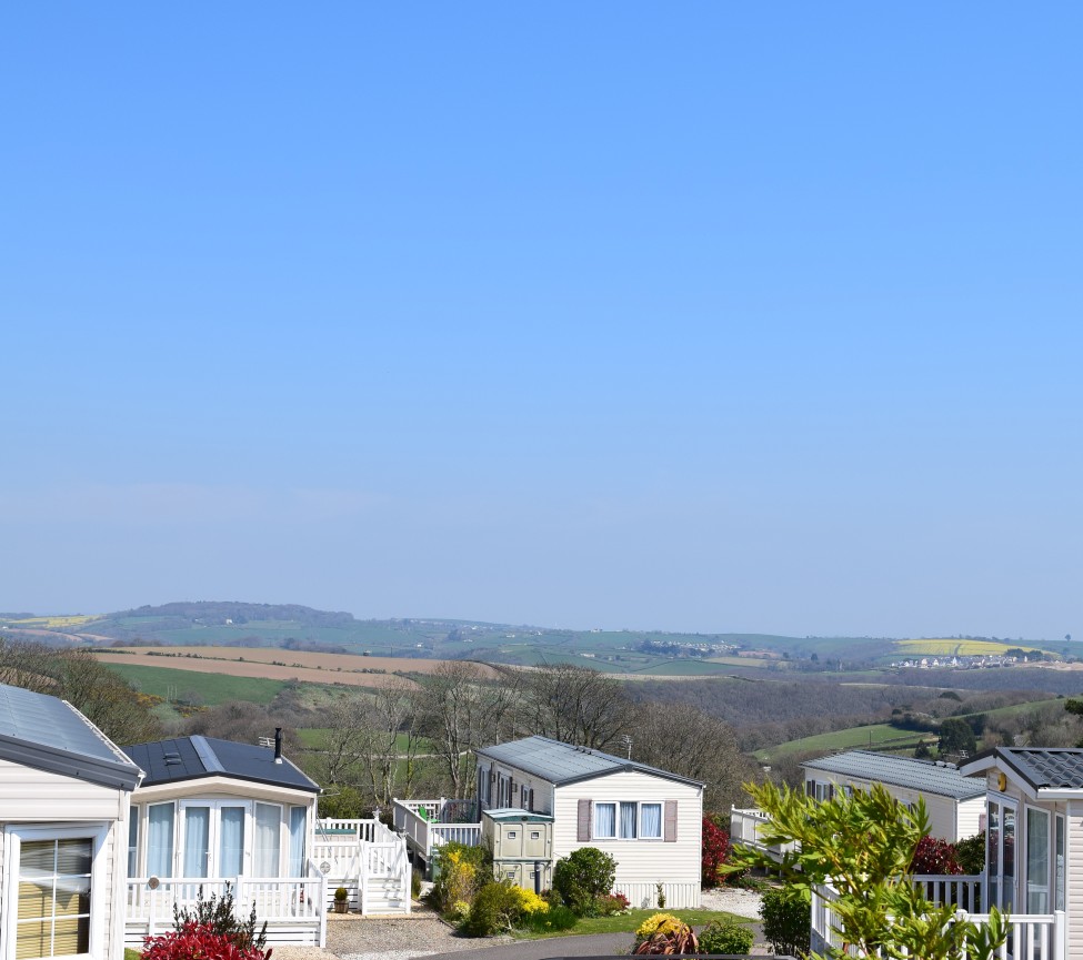 view of the caravans and countryside at Oaklands Park near Looe