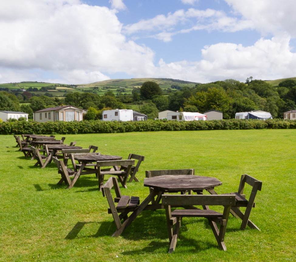 Harford Bridge Holiday Park seating area for picnics