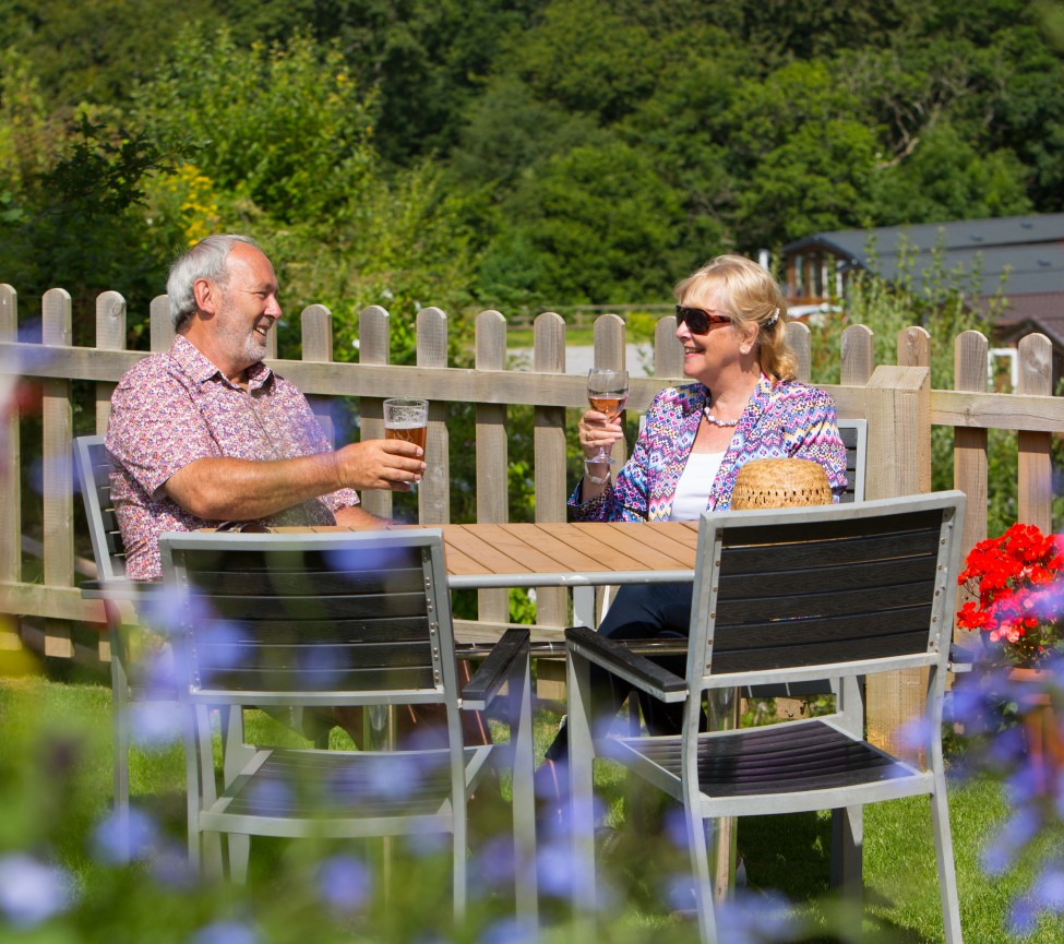 Relaxing outdoors at Castle Brake Holiday Park