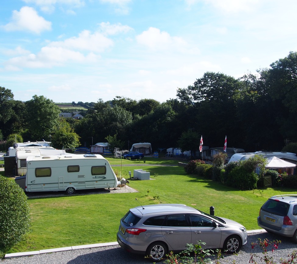 trees and caravans at Trekenning Tourist Park