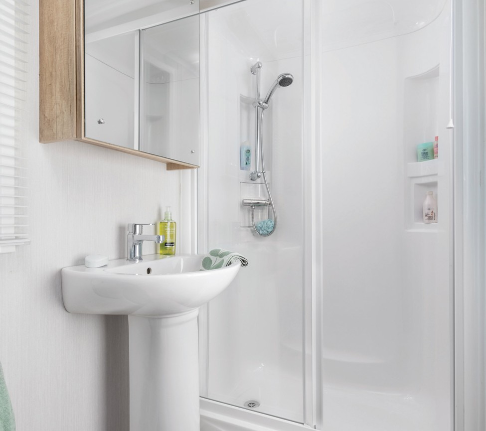 Shower room with shower in the 2024 Swift Burgundy with sink