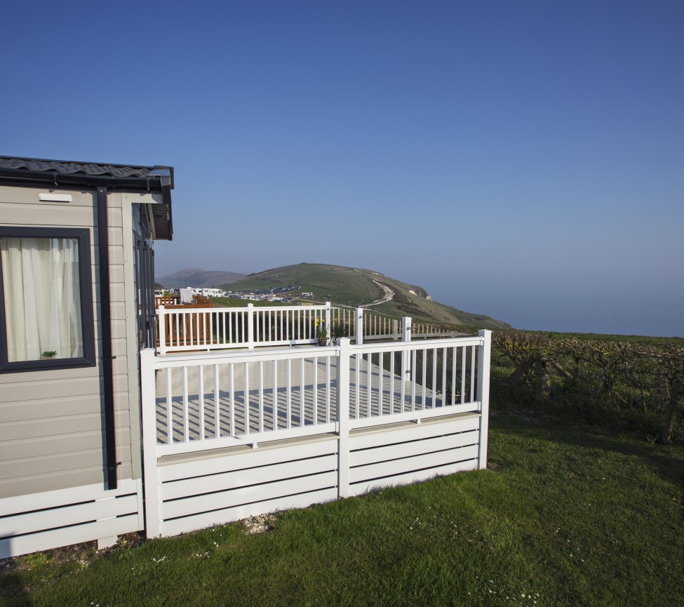 Durdle Door Holiday Park caravans looking to the sea