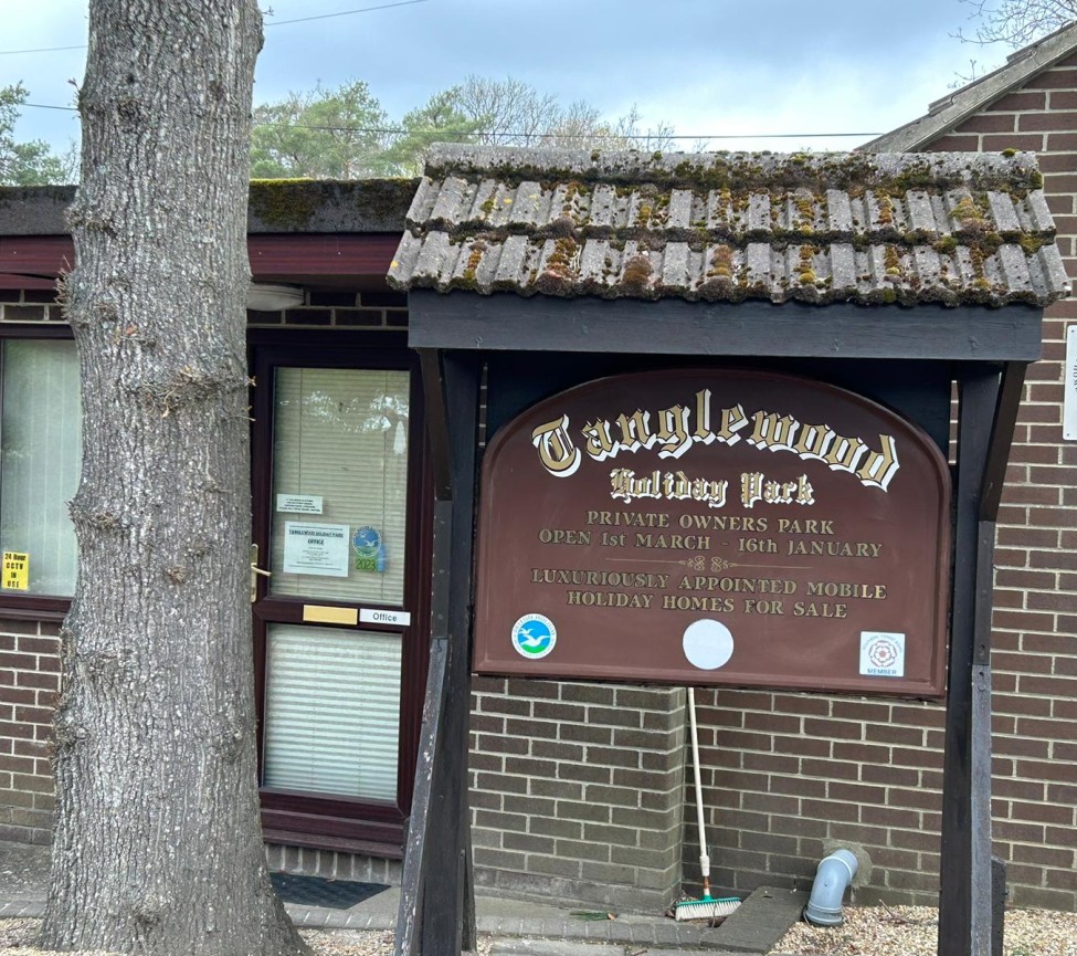 the sign welcoming people to Tanglewood Holiday Park