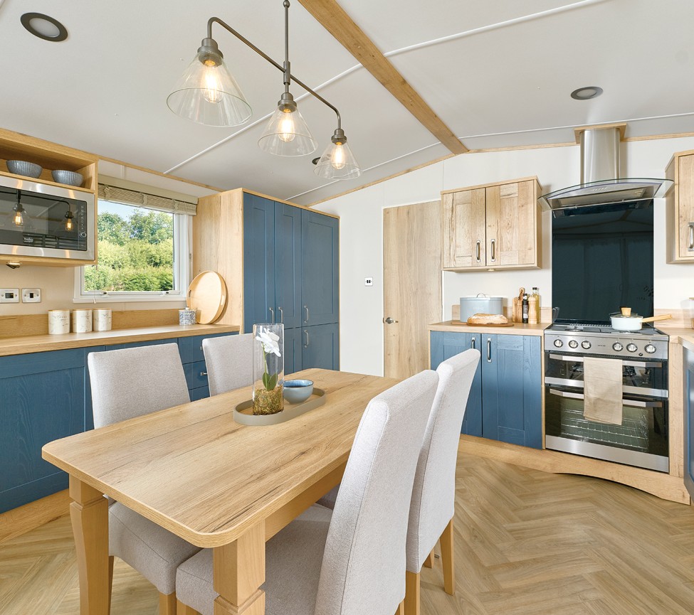 dining area and kitchen in the 2025 ABI Windermere