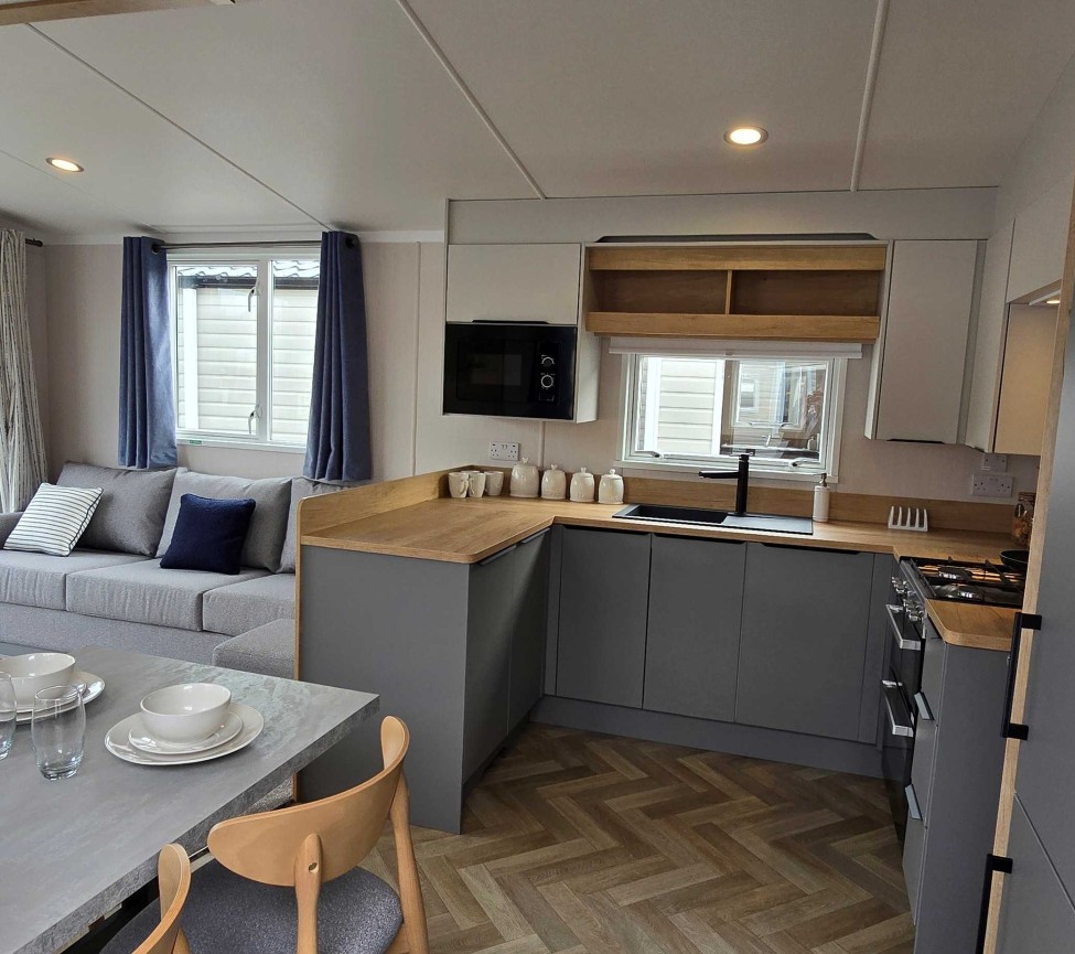 Interior Kitchen and Dining view of the 2025 Swift Ardennes