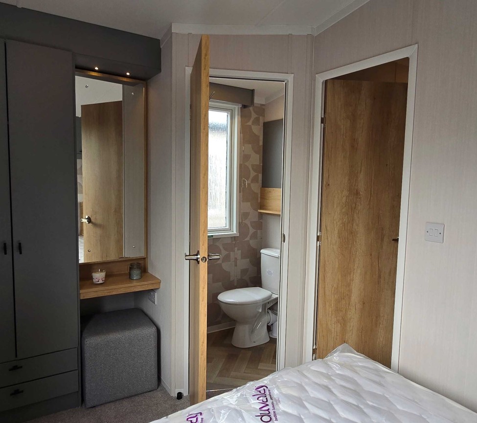 Interior Master Bedroom and Ensuite view of the 2025 Swift Ardennes