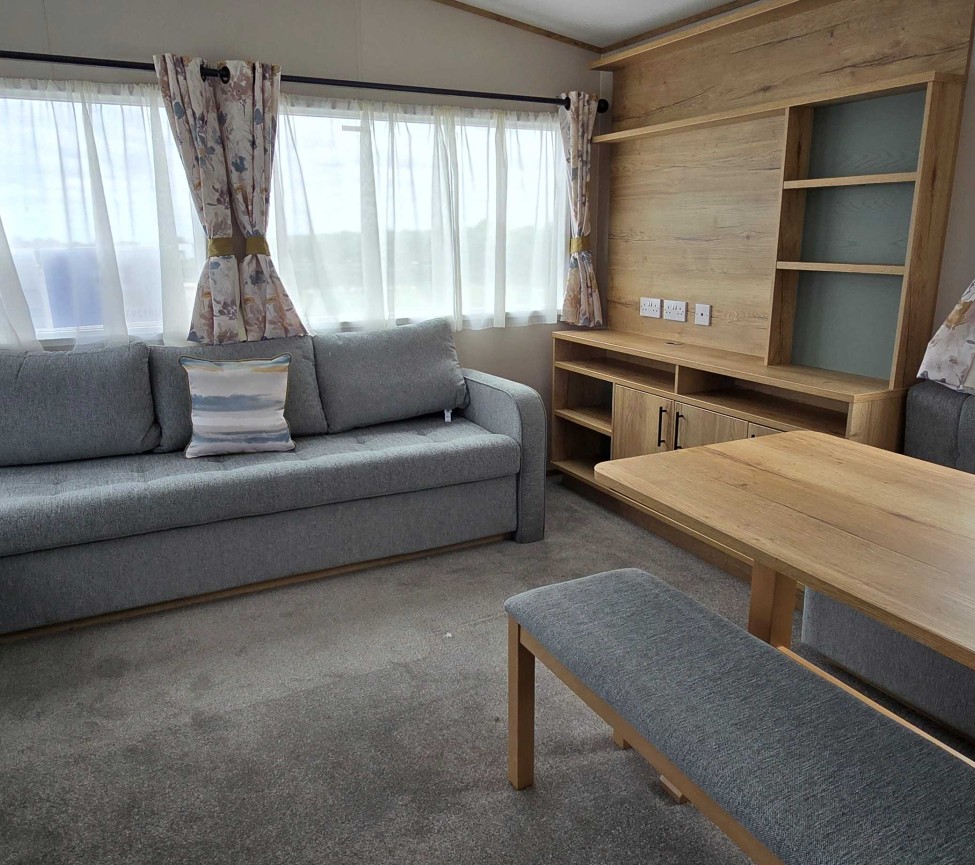 Dining and Lounge view of the 2025 ABI Coworth Deluxe 28 x 12 for Sale at Westbrook Farm Caravan Park
