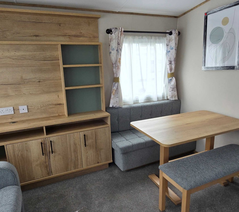 Dining and Lounge view of the 2025 ABI Coworth Deluxe 28 x 12 for Sale at Westbrook Farm Caravan Park