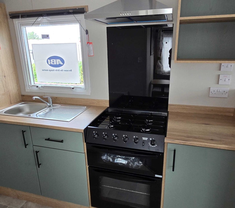 Kitchen view of the 2025 ABI Coworth Deluxe 28 x 12 for Sale at Westbrook Farm Caravan Park