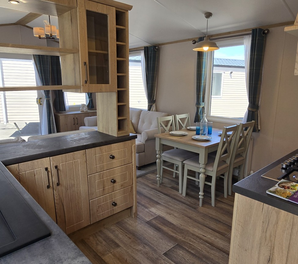 Interior Kitchen and Dining view of the 2023 Atlas Debonair 36 x 12