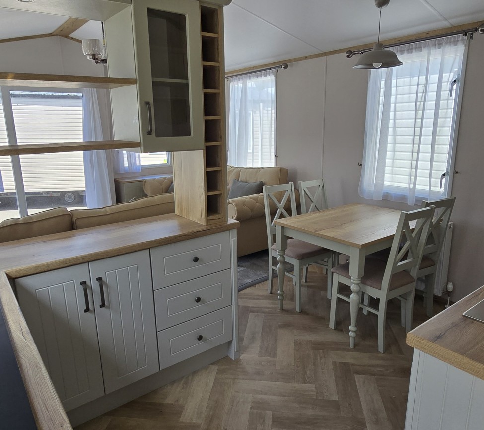 Interior Kitchen and Dining view of the 2023 Atlas Debonair 38 x 12 x 3 Bedroom