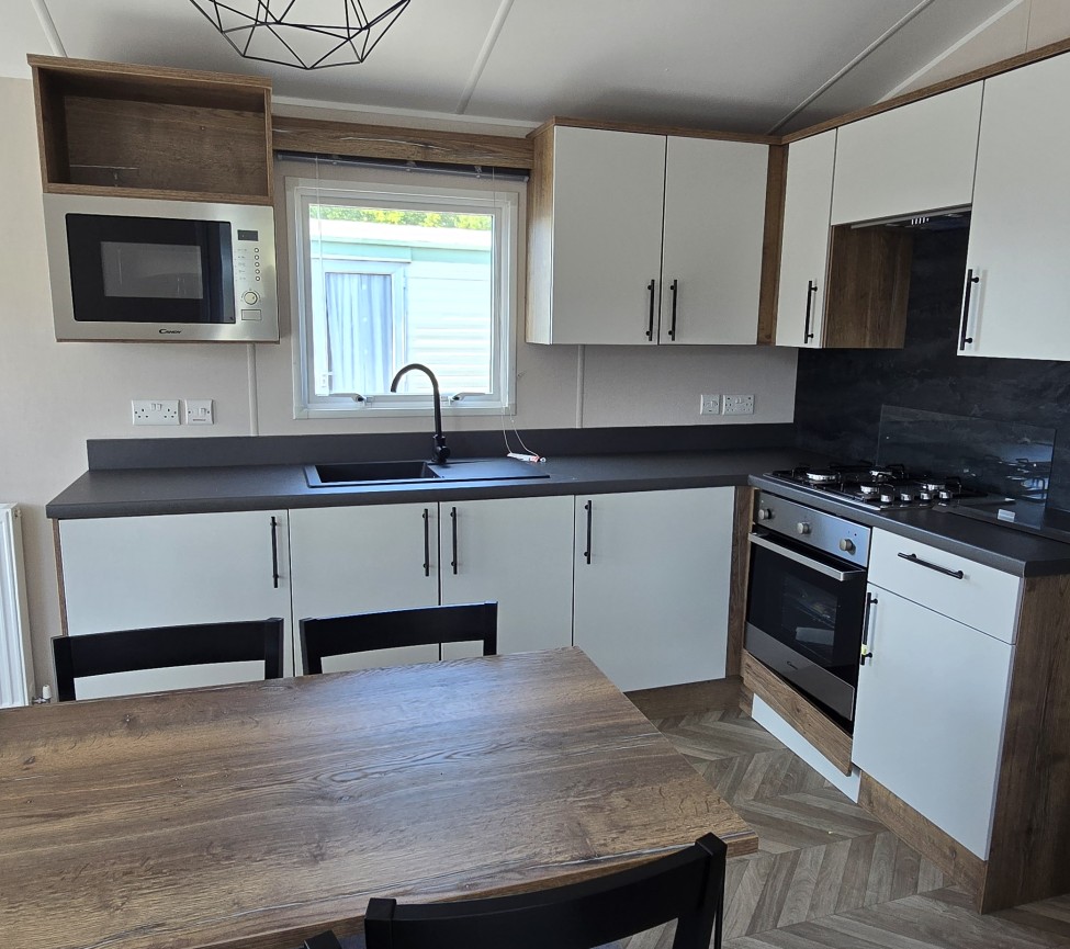 Interior Kitchen and Dining view of the 2024 Atlas Sahara 39 x 12 x 3 Bedroom
