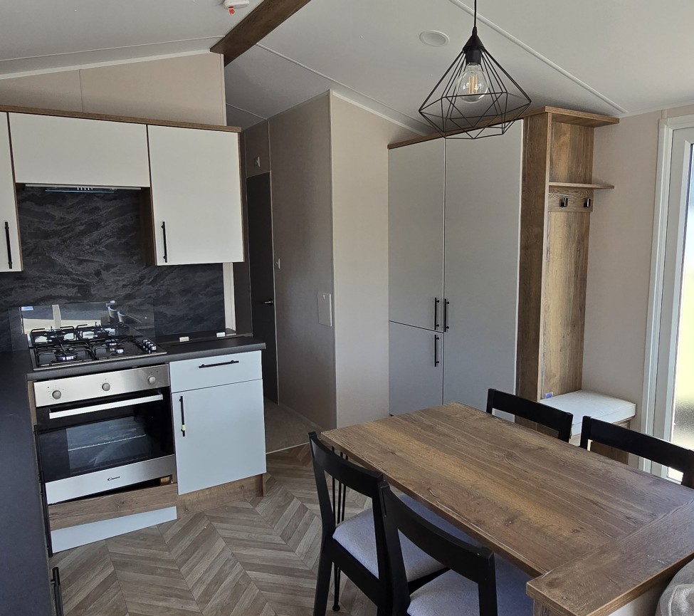 Interior Kitchen and Dining view of the 2024 Atlas Sahara 39 x 12 x 3 Bedroom