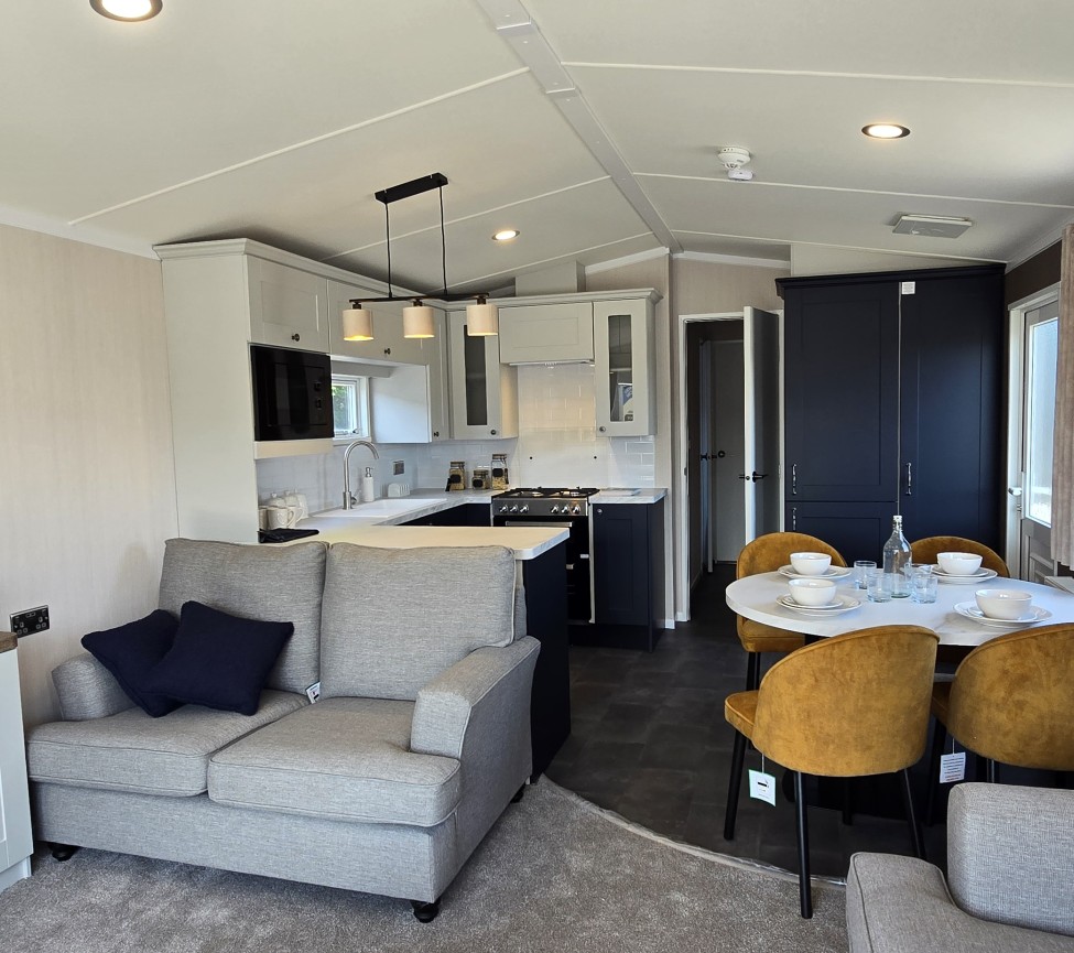 Interior Lounge Area, Dining Area, and Kitchen view of the 2025 Swift Margaux 35 x 12 - 2 Bedroom