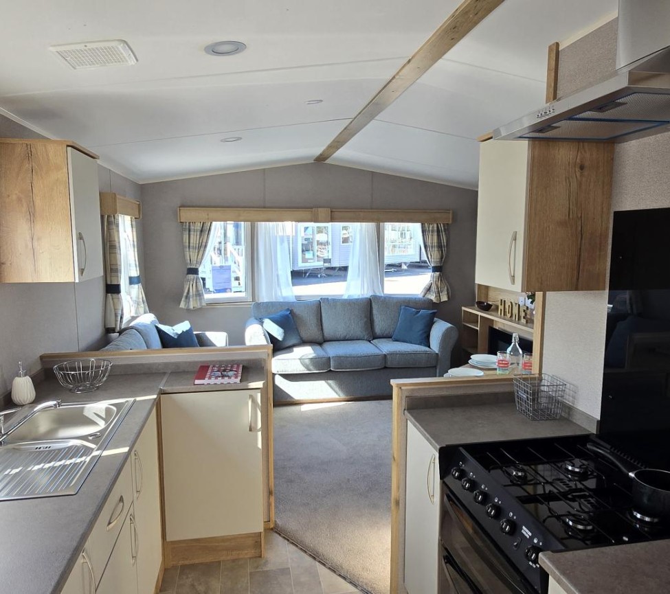 Interior Kitchen and Lounge view of the 2025 ABI Summer Breeze Deluxe