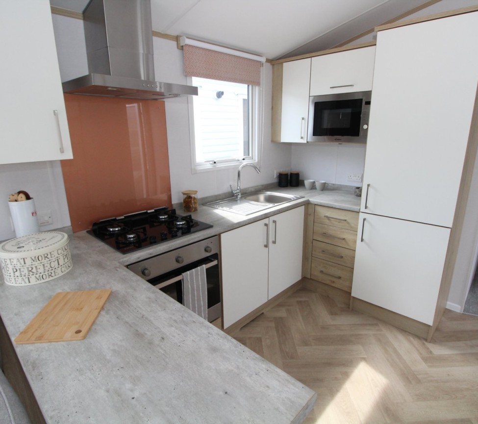 Fitted kitchen with appliances in the Chorus